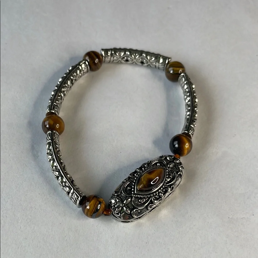Silver and Brown Beaded Bracelet with Ornate Charm
